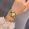 3217-2.png Opulent Gold-Toned Statement Watch and Bracelet Set