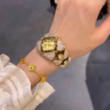 3217-3.png Opulent Gold-Toned Statement Watch and Bracelet Set