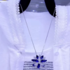 3223-4.png Elegant White Layered Outfit with Striking Blue Necklace