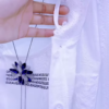 3223-5.png Elegant White Layered Outfit with Striking Blue Necklace