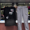 3234-1.png Black Open-Knit Top with Floral Appliqués and Gray Pants