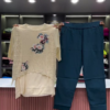 3234-2.png Black Open-Knit Top with Floral Appliqués and Gray Pants