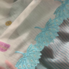 Sheer Pink Fabric with Intricate Flamingo and Floral Embroidery