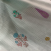 Sheer Pink Fabric with Intricate Flamingo and Floral Embroidery