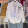 3328-2.png Embroidered White Shirt and Light-Wash Denim Ensemble