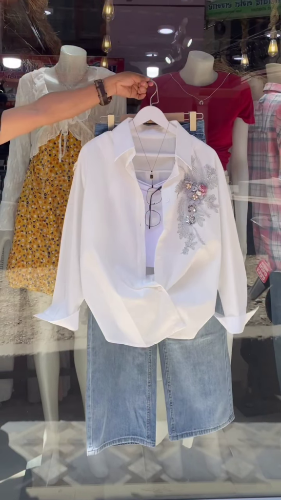 Embroidered White Shirt and Light-Wash Denim Ensemble - Photo 1