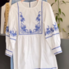 3345-2.png Embroidered White Peplum Tunic with Blue Floral Accents